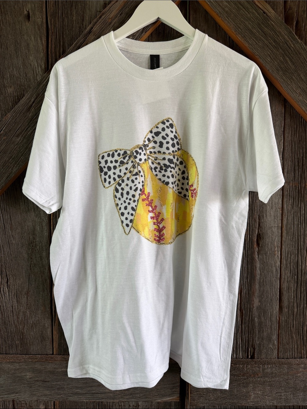 White Tee with Yellow Softball & Black Spot Bow Graphic